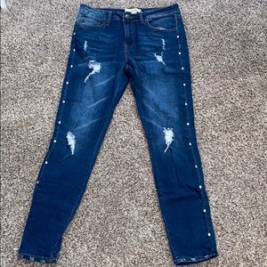 Distressed blue jeans